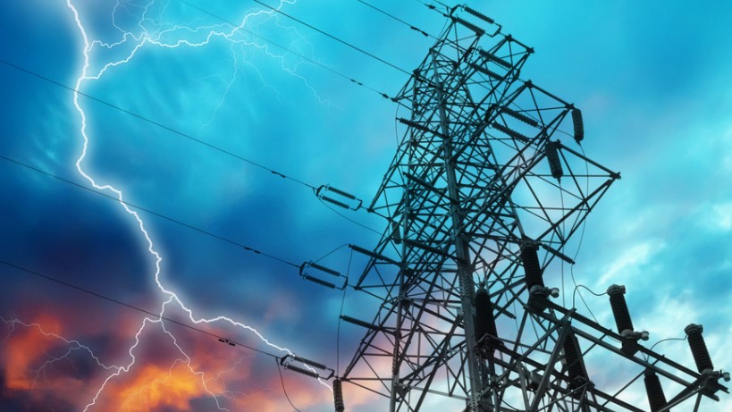 A rocket ignited and knocked down a high-tension power cable into a dense crowd killing 35 people