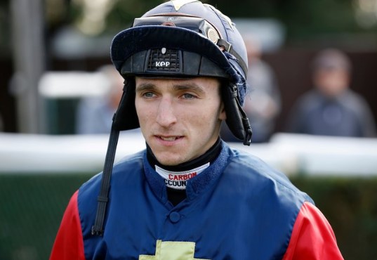 Jockey Willie Carson is injured by a horse at Newbury, Berkshire.
